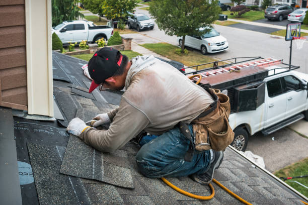 Professional Roofing technician working in Moosic, PA